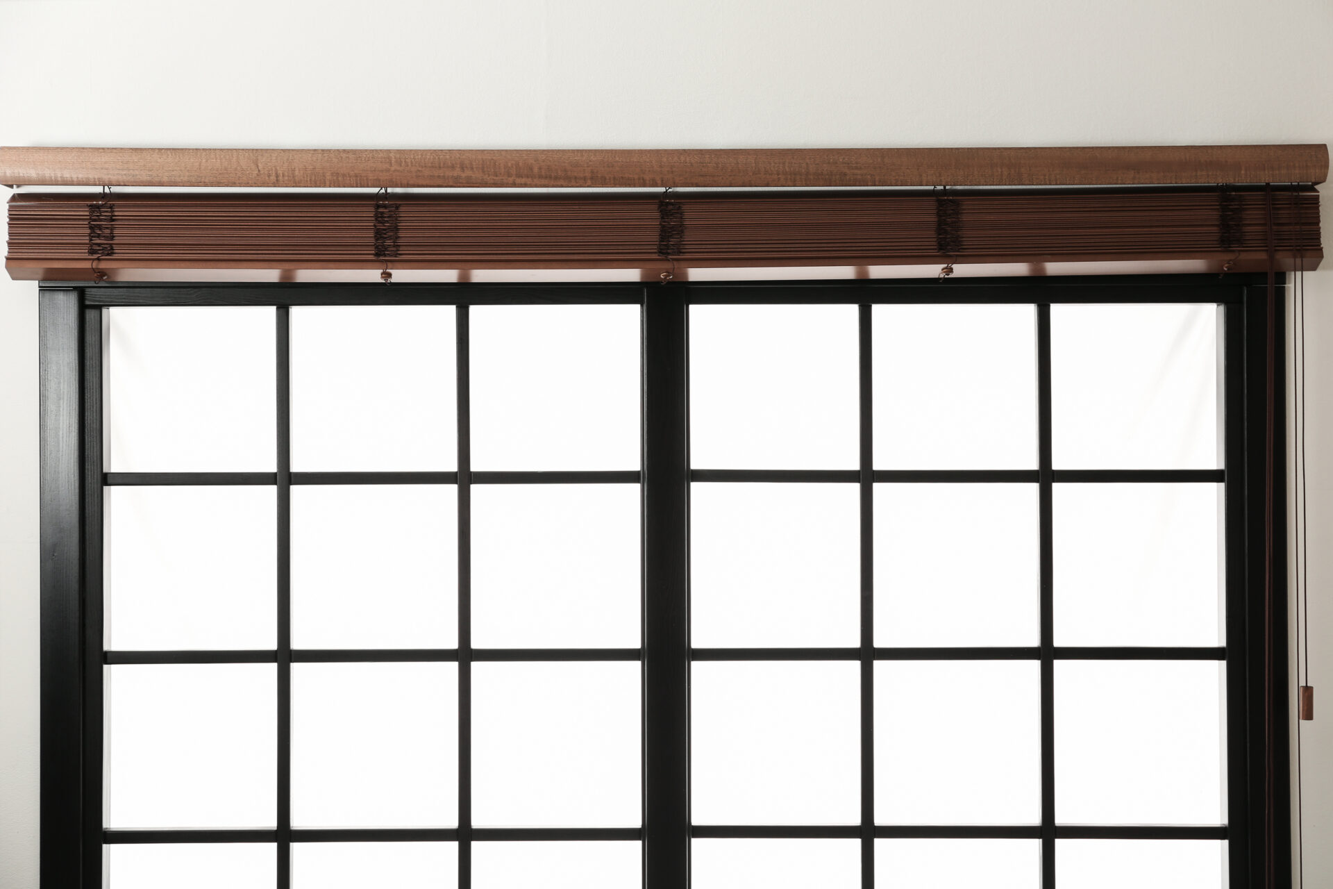 Modern window blinds with stylish faux wood blinds on door. Wholesale Blind Factory.