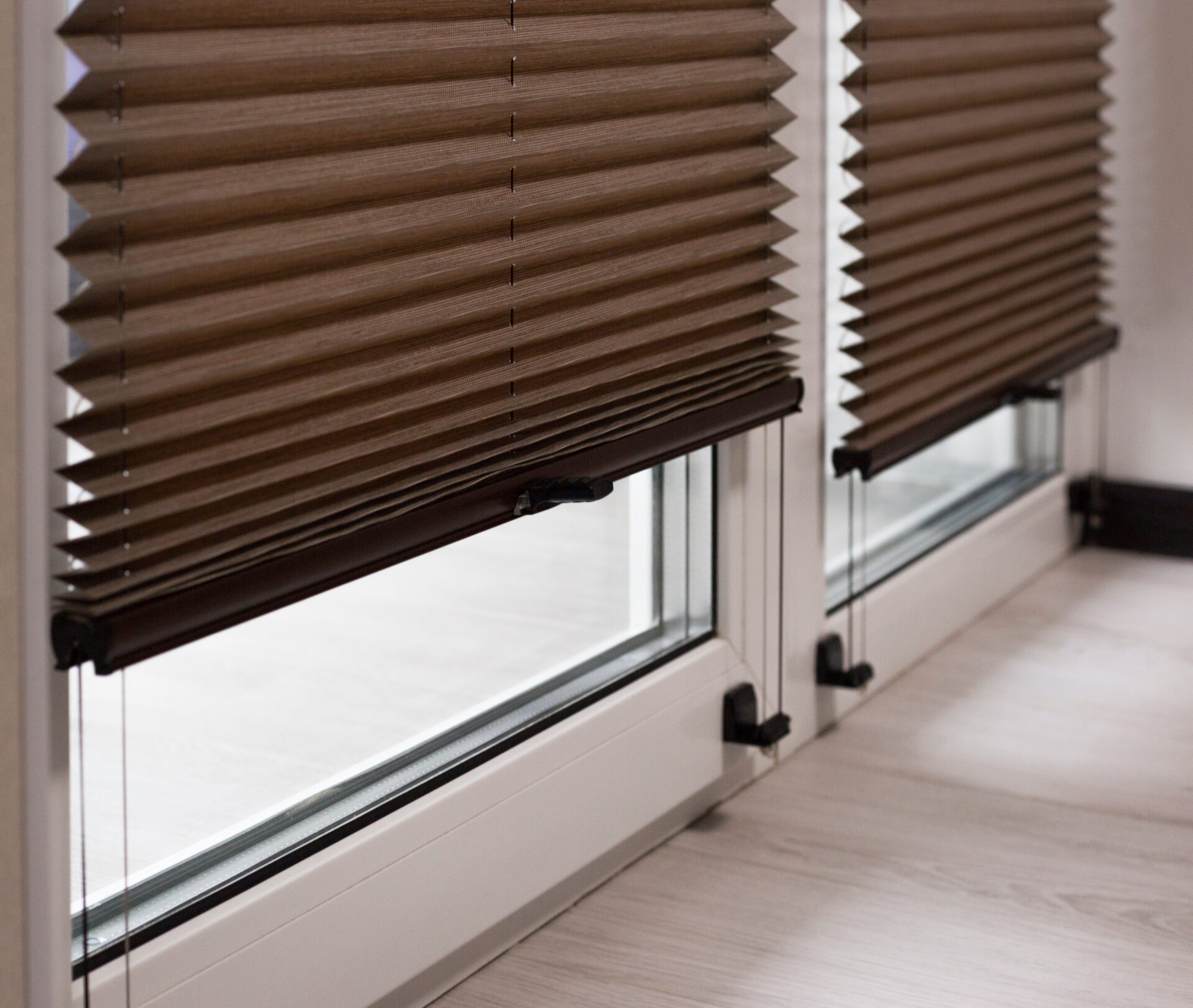 Pleated Blinds in modern living room interior. Wholesale Blind Factory